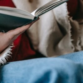 A young woman with a book in her hand